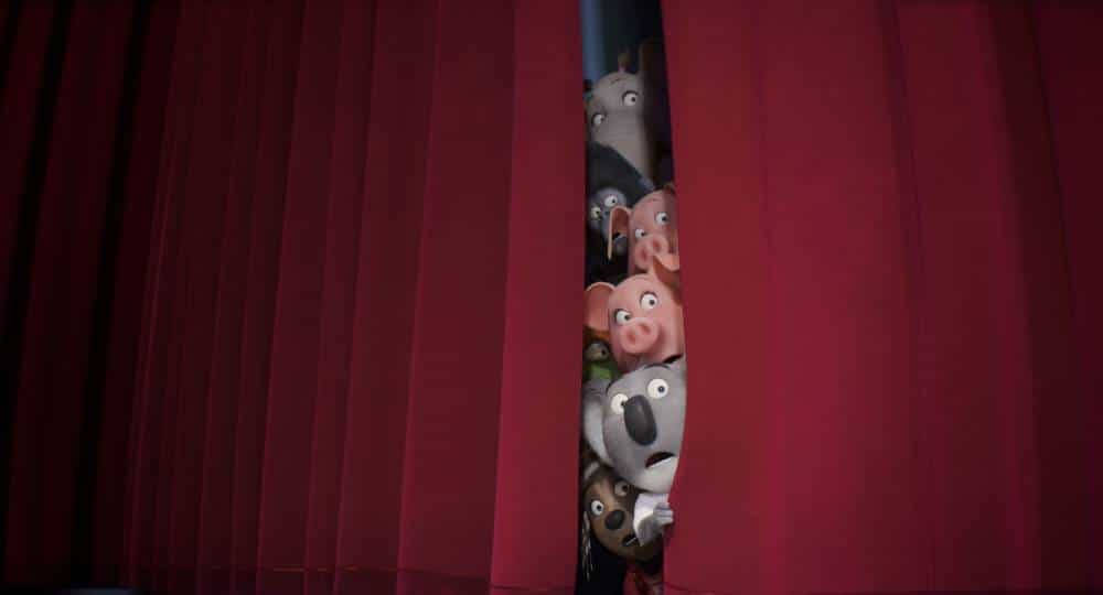 curtain opening 桌布 壁紙 — 動畫動物從分開的紅色劇院窗簾中探出頭來，睜大眼睛好奇地窺視。