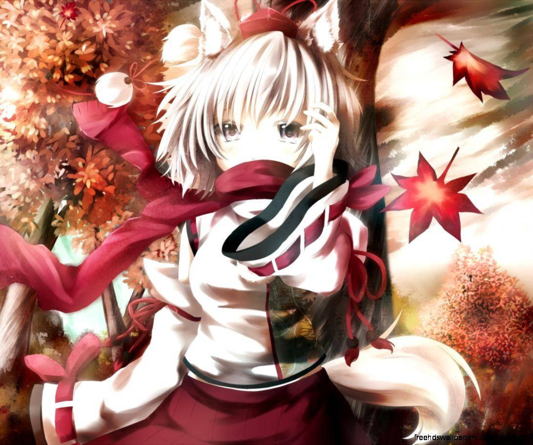 Ecchi 桌布 壁紙 — 動畫女孩，有狐狸耳朵和紅色圍巾，站在溫暖金色光線下飄落的秋葉中。