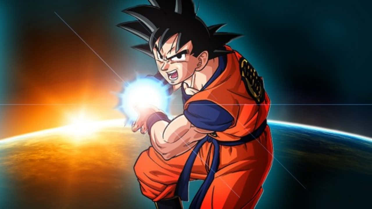 龍珠Z 桌布 壁紙 — 動畫戰士悟空身穿橙色道服，在熾熱星球背景下將能量匯聚成發光球體。