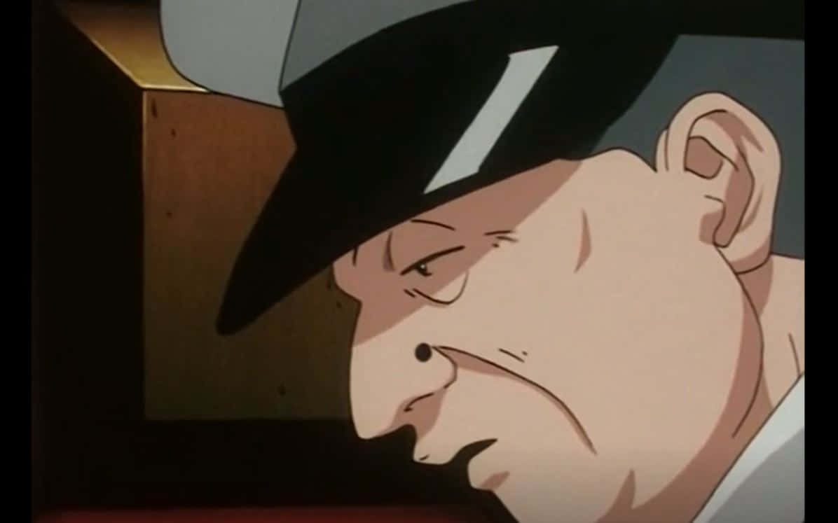 Hunter X Hunter Zebro 桌布 壁紙 — 動畫男子戴著帶有白色條紋的黑色軟呢帽，低頭露出嚴肅表情的特寫。