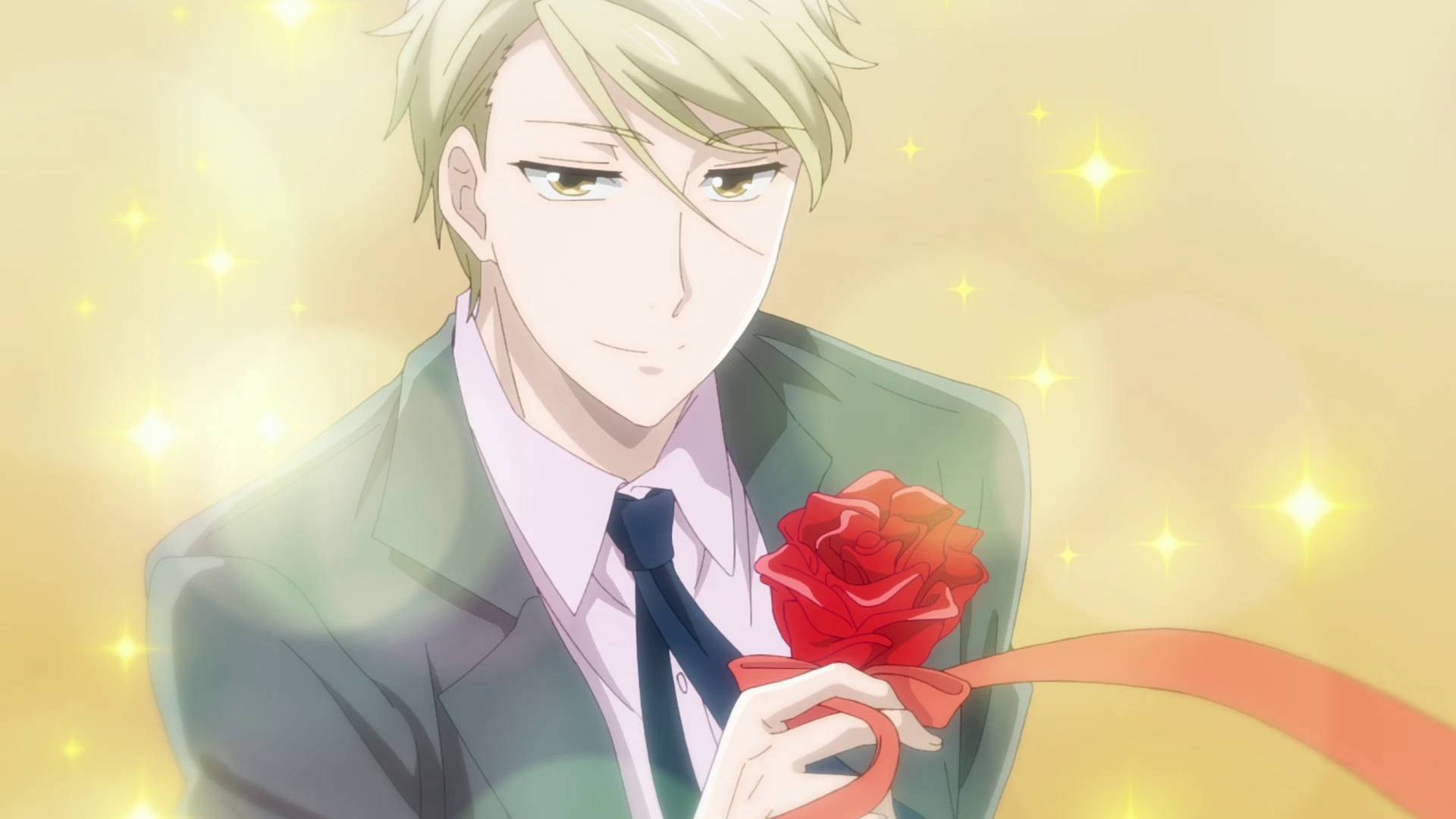 koikimo 桌布 壁紙 — 動畫男子西裝筆挺，手持紅玫瑰，背景是閃爍的金色光芒和柔和散景。