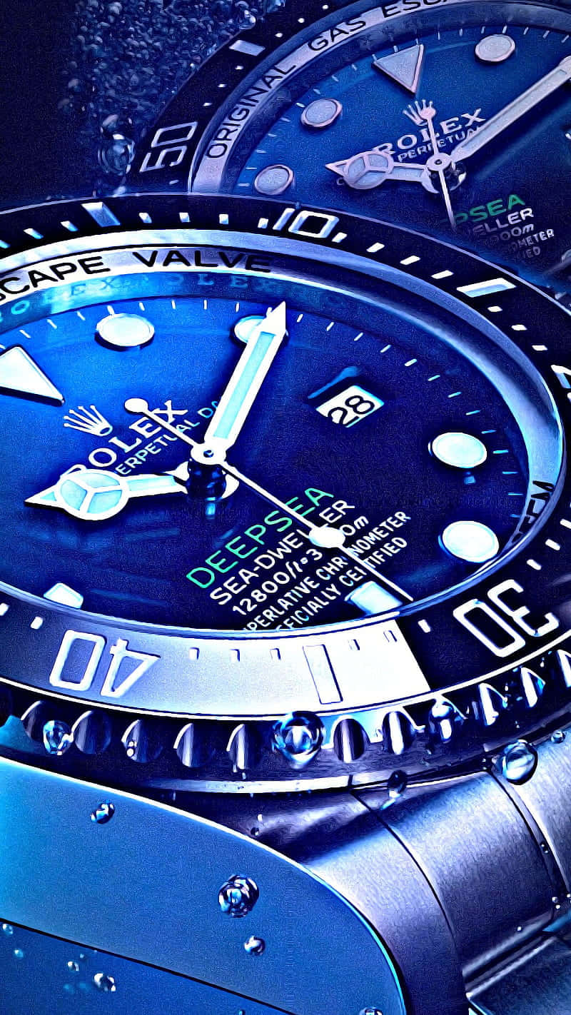 Rolex 桌布 壁紙 — 勞力士Deepsea手錶特寫，藍色錶盤，金屬錶圈和錶帶上有水滴。