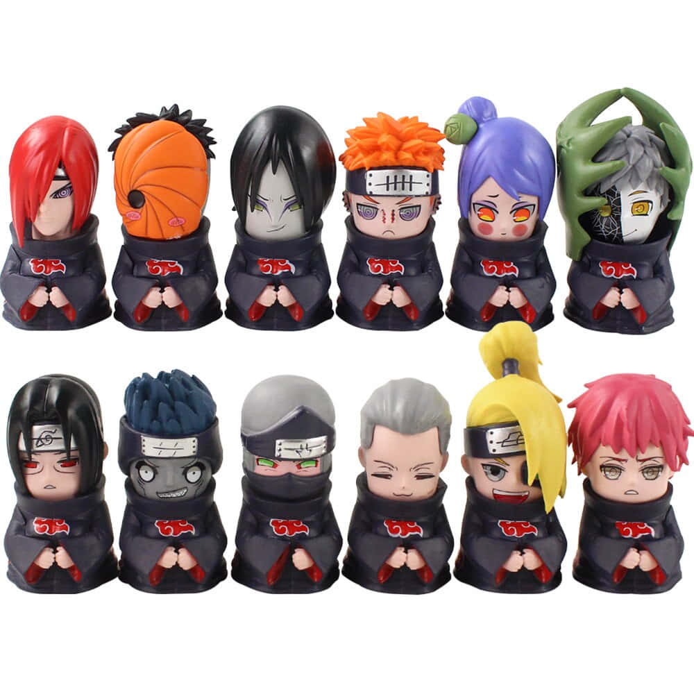Akatsuki Chibi 桌布 壁紙 — 十個Q版火影忍者角色穿著帶有紅色雲紋的黑色曉組織長袍，在白色背景前雙手合十擺姿勢。