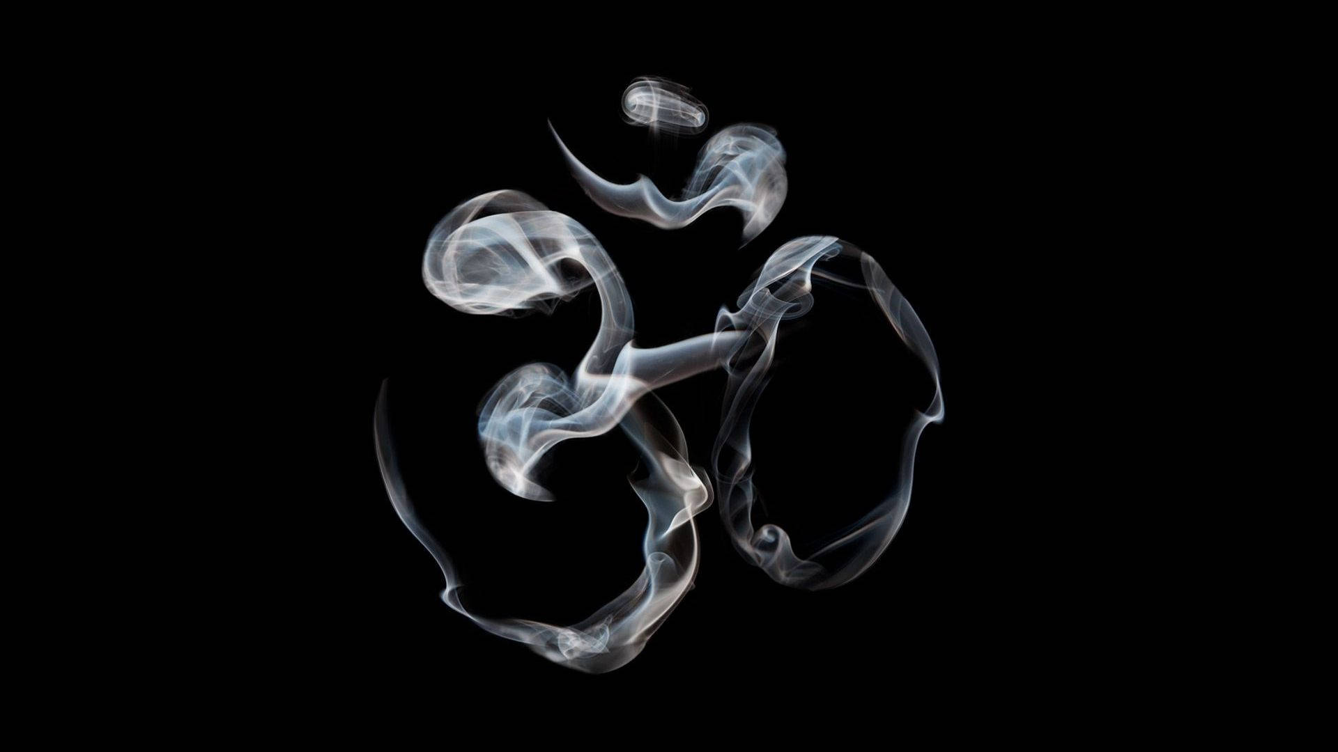 shiva dark 桌布 壁紙 — 半透明煙霧形成的「唵」符號漩渦，在純黑背景上帶有柔和發光邊緣。