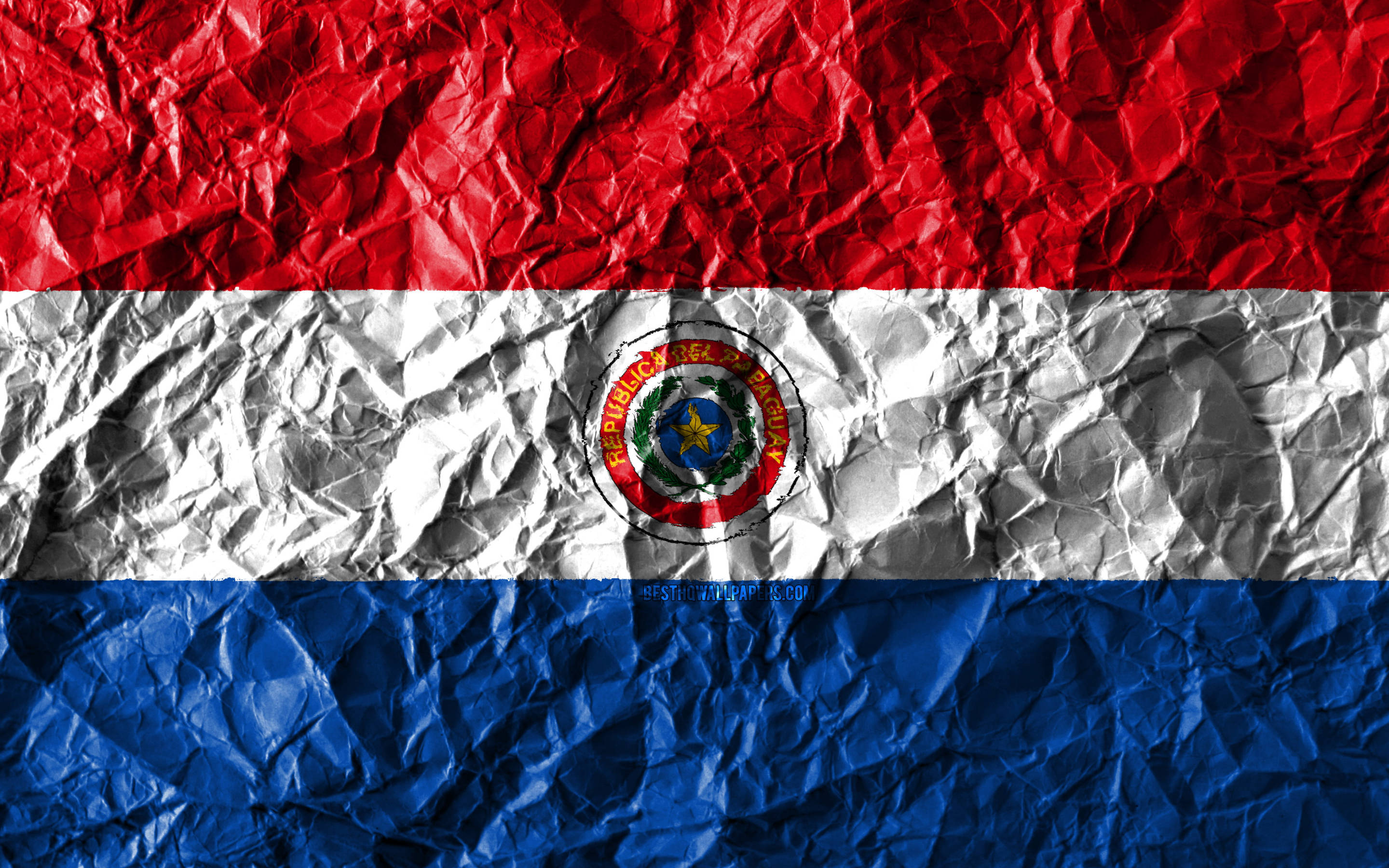 Paraguay 桌布 壁紙 — 南韓國旗，以皺紙製成，有紅、白、藍色條紋，銀色帶中央有國徽。