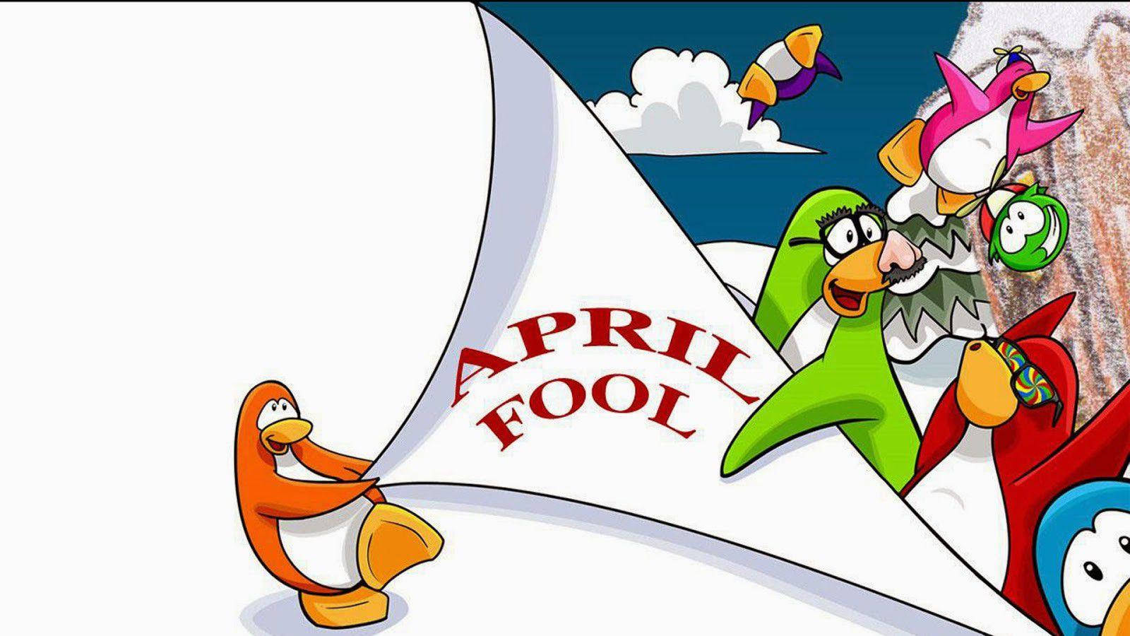Fools 桌布 壁紙 — 卡通企鵝拉開一個巨大的橫幅，在雪山背景下揭示「APRIL FOOL」，火箭在上空飛過。