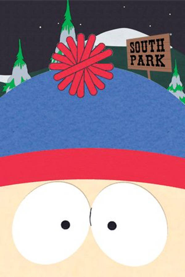 stan marsh 桌布 壁紙 — 卡通男孩臉部特寫，戴著藍色帽子配紅色絨球，背景是雪夜和「South Park」標誌。