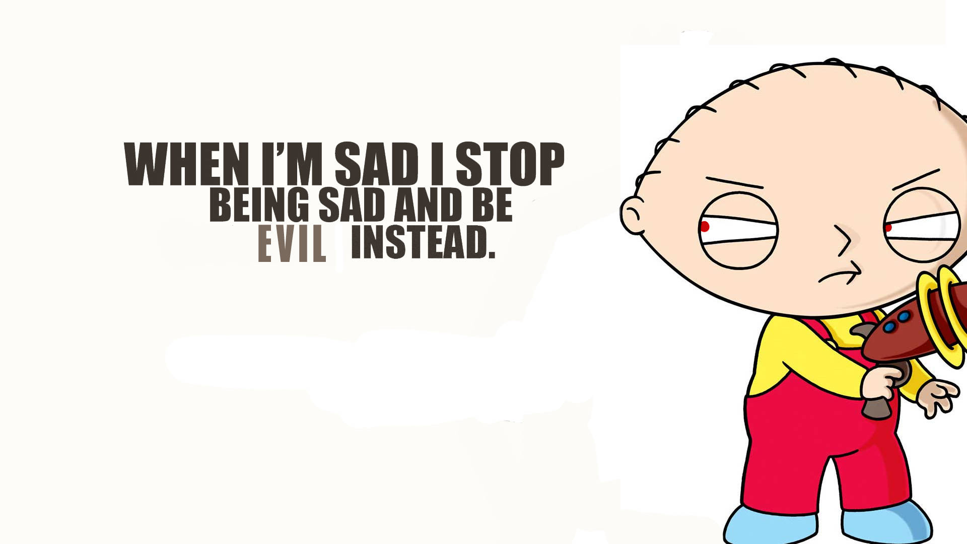 卡通角色 Stewie Griffin 手持玩具槍，附有將悲傷變成邪惡的文字。 — 彼得·格里芬 壁紙