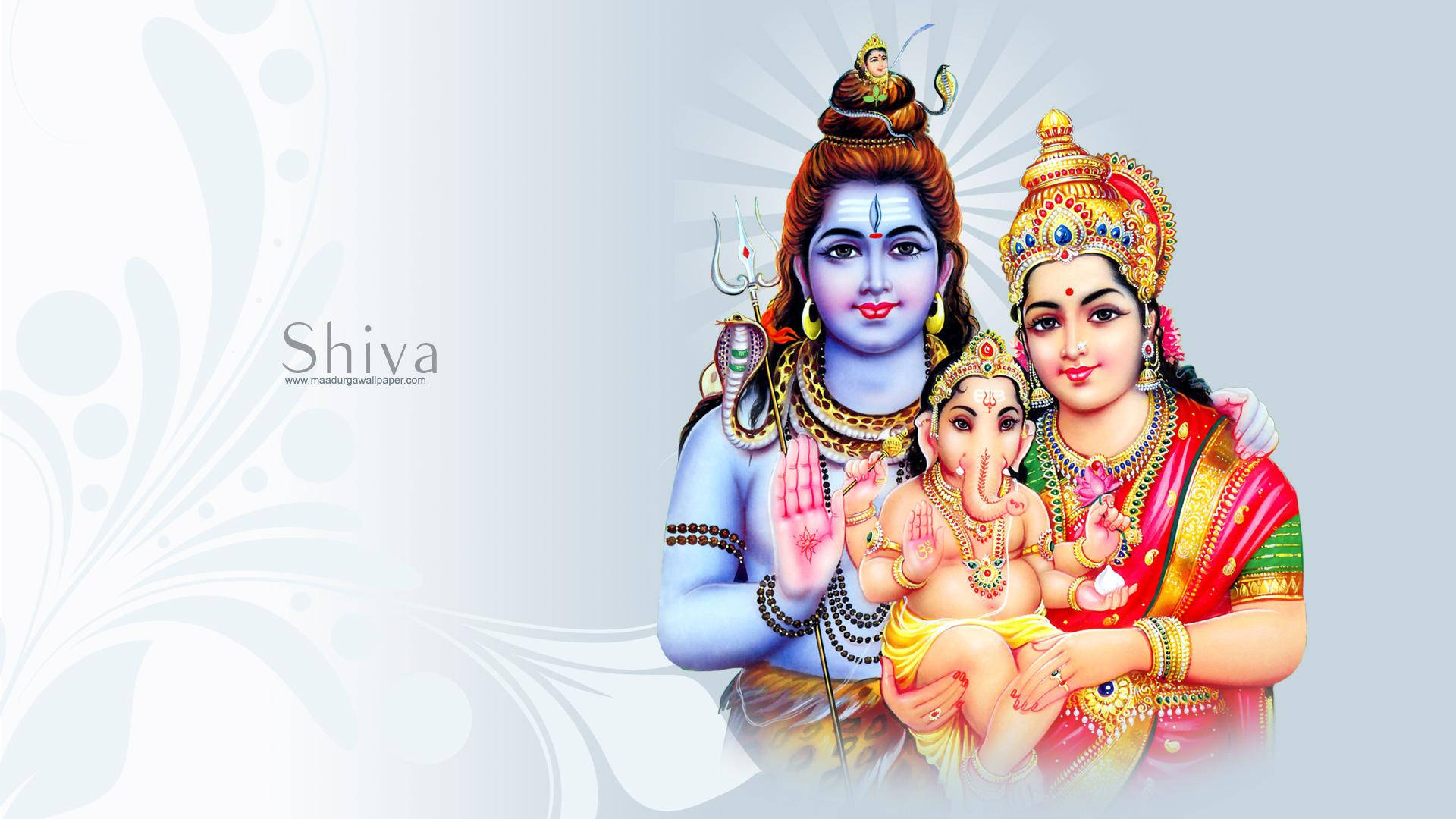 Lord Shiva Family 桌布 壁紙 — 印度教神祇濕婆帕爾瓦蒂和象頭神在柔和花卉背景前以鮮豔傳統服飾描繪。