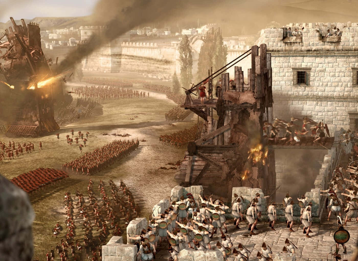 Total War Rome 2 桌布 壁紙 — 古代士兵在混亂的攻城戰中交鋒，燃燒的攻城塔和煙霧在石牆上升起。