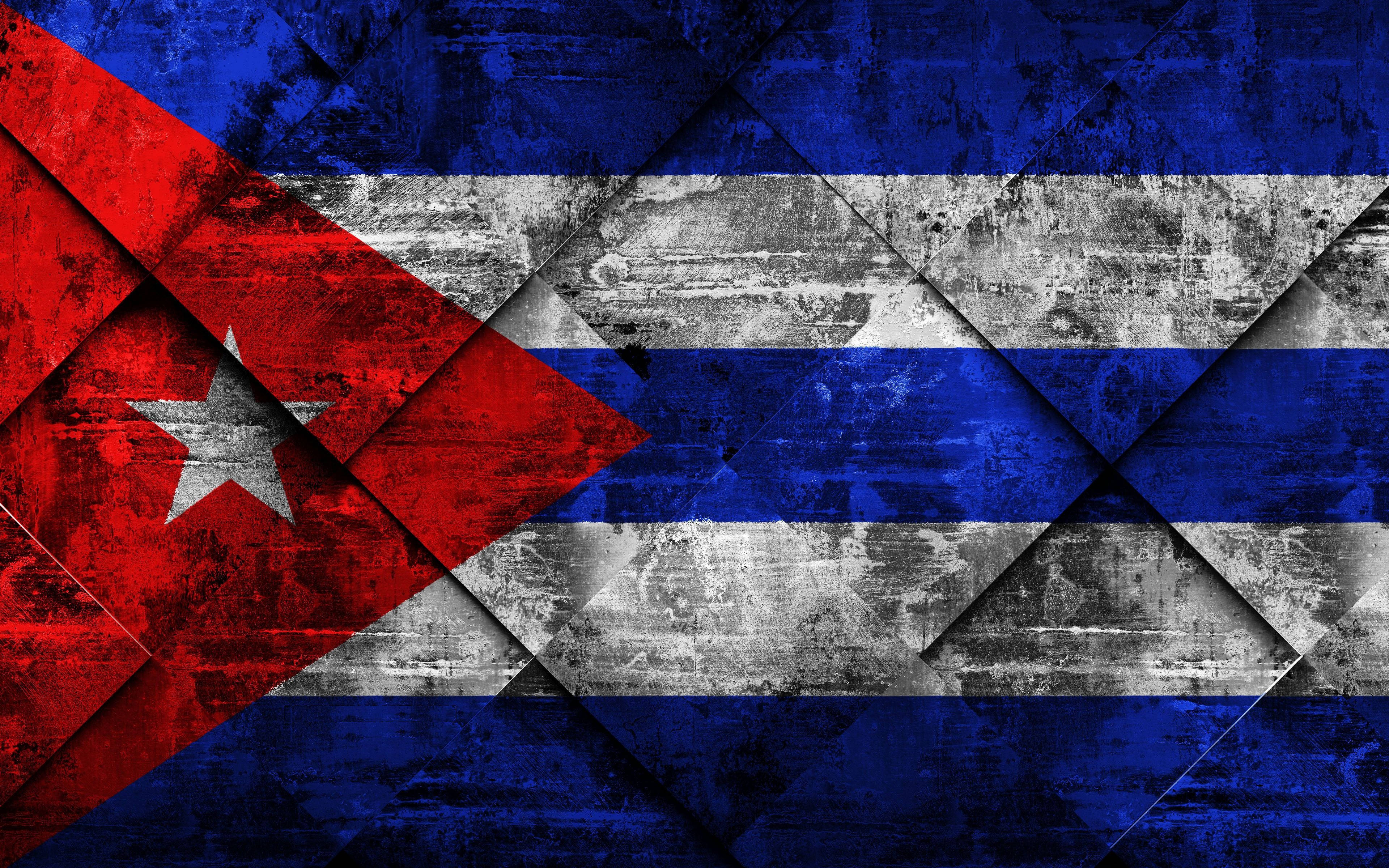 Cuban 桌布 壁紙 — 古巴國旗以磨損幾何圖案呈現，採用大膽的紅、白、藍色。