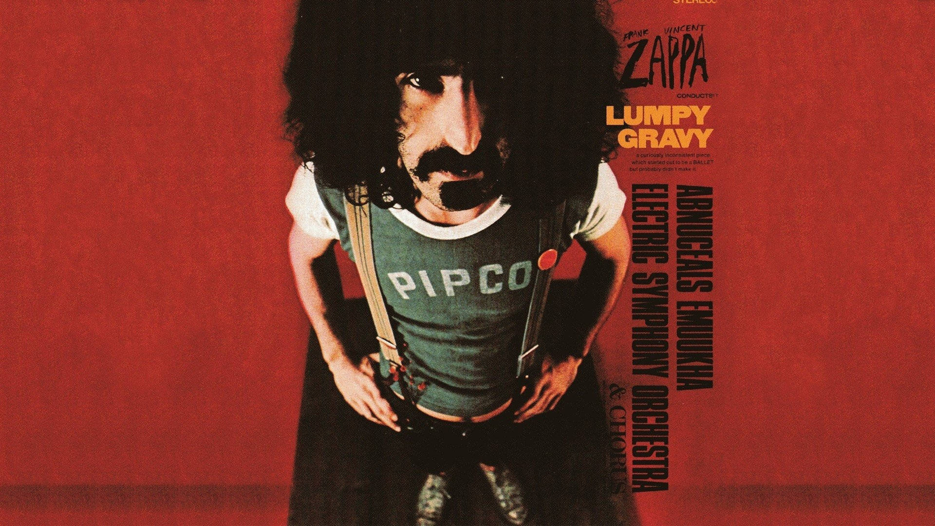 Zappa 桌布 壁紙 — 古怪音樂家 Frank Zappa 在 'Lumpy Gravy' 專輯封面上，對著鮮紅色的背景凝視。