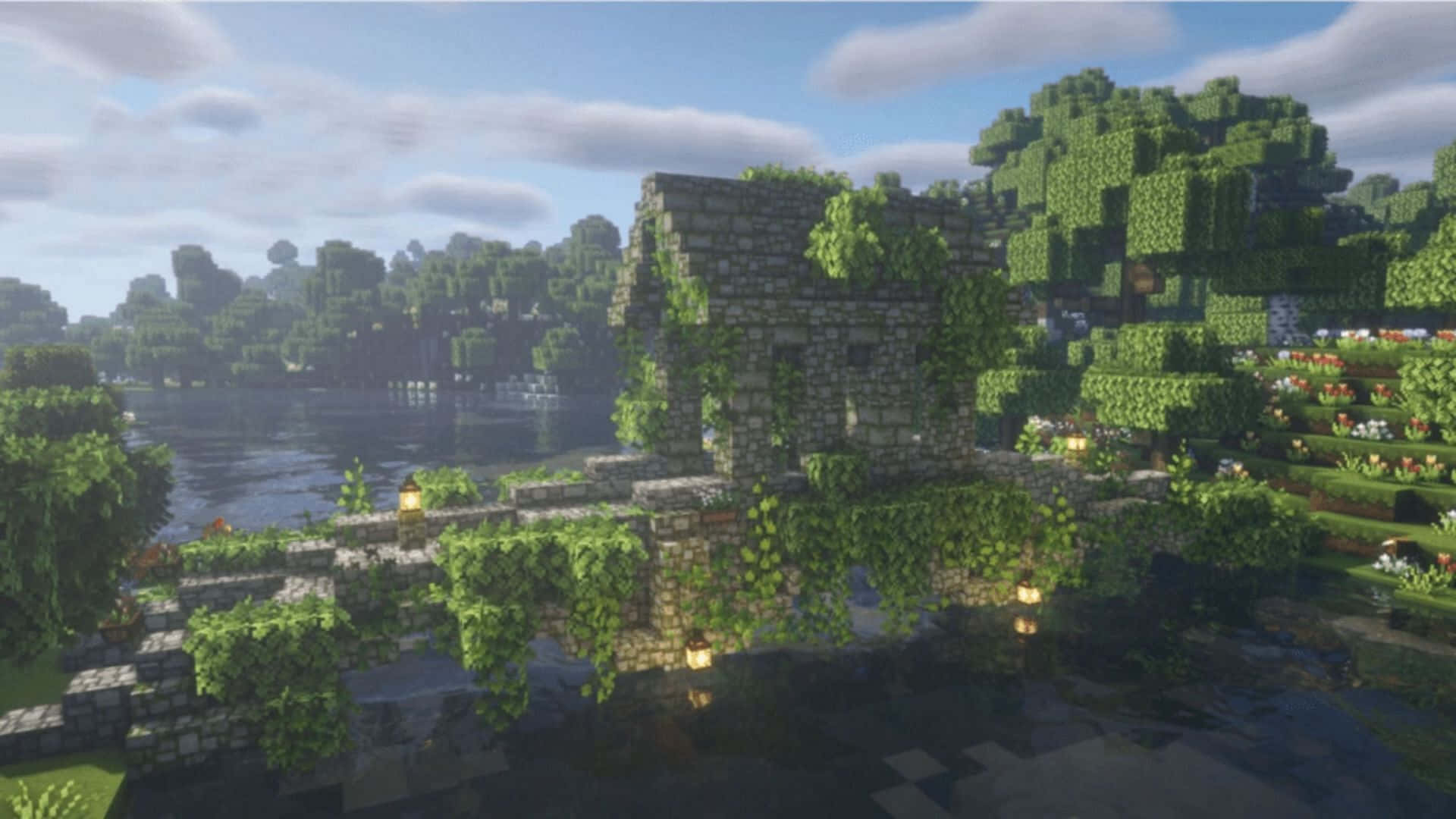Minecraft Bridges 桌布 壁紙 — 古老的石頭廢墟被藤蔓覆蓋，坐落在平靜的湖邊，在明亮的天空下呈現出充滿活力的Minecraft景觀。