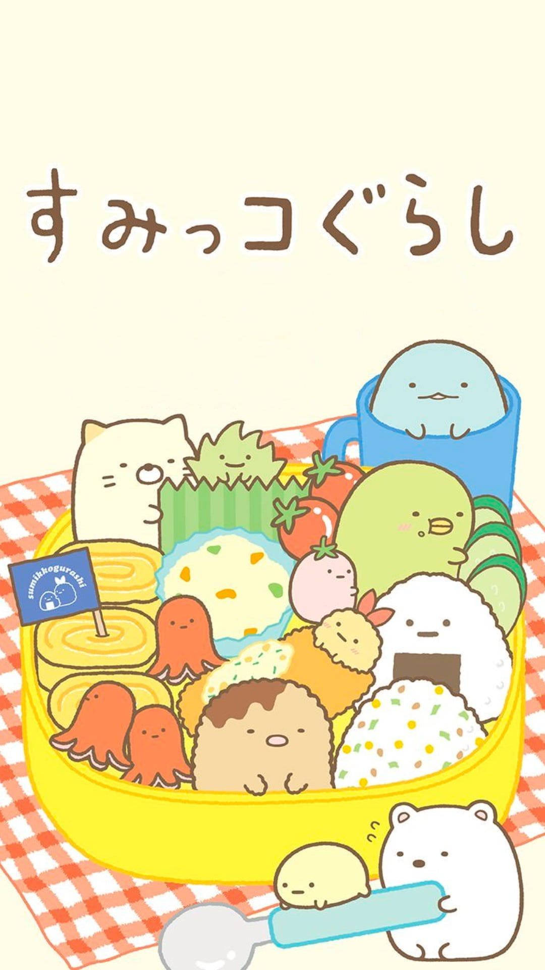 角落生物 桌布 壁紙 — 可愛的Sumikko Gurashi角色從紅色格子布上的一個色彩繽紛的便當盒中探出頭來。