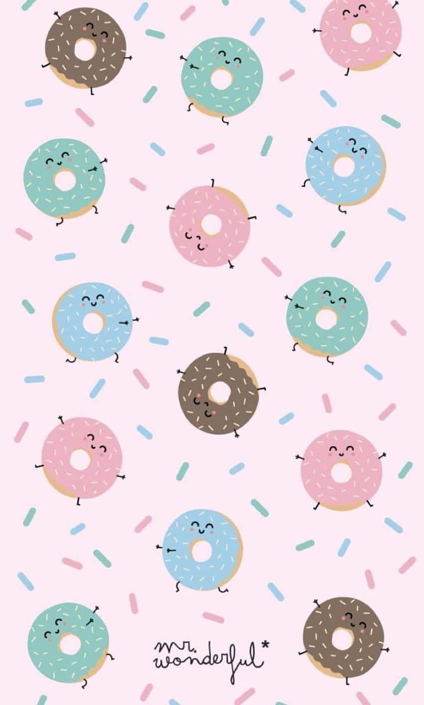 Cute Donut 桌布 壁紙 — 可愛的卡通甜甜圈，有臉和腿，在撒滿彩色紙屑的粉彩粉紅色背景上歡快地跳躍。