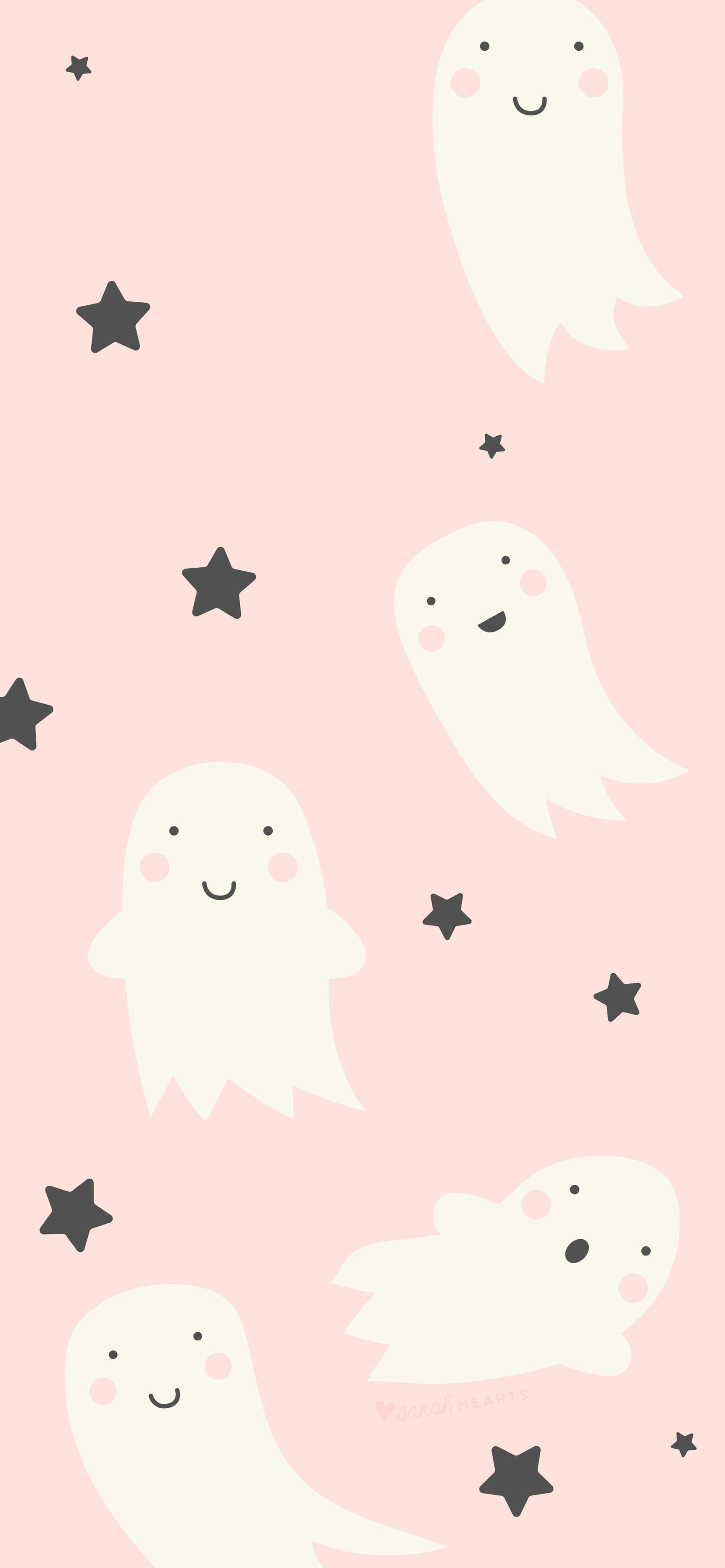 Cute Ghost 桌布 壁紙 — 可愛的白色卡通幽靈，臉頰泛紅，在柔和的粉紅色背景上漂浮在黑色星星之間。