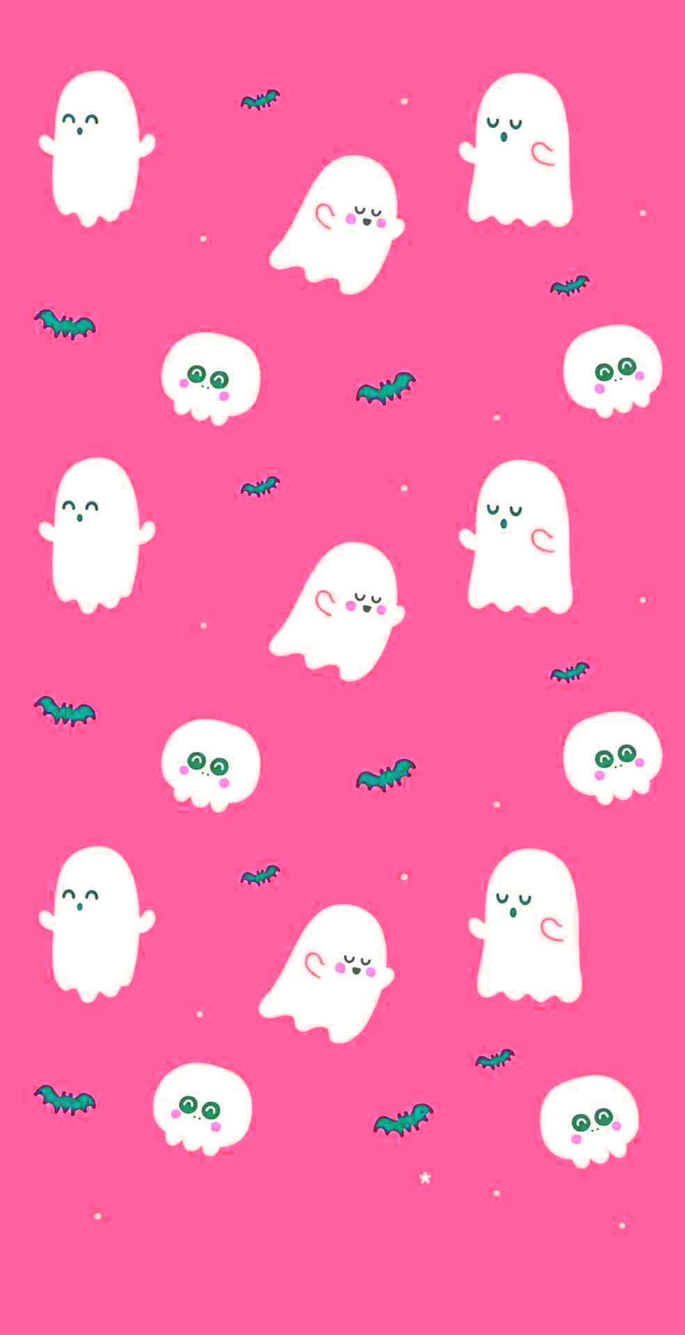 Cute Ghost 桌布 壁紙 — 可愛的白色卡通幽靈和蝙蝠在充滿活力的粉紅色背景上頑皮地漂浮，背景上散落著星星。