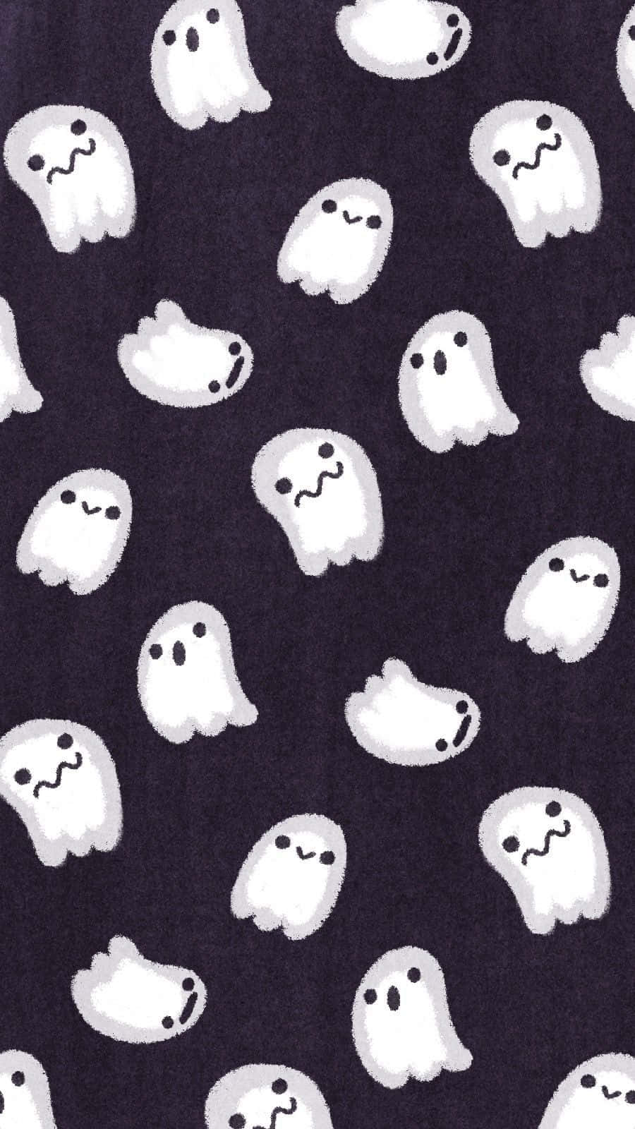 Cute Ghost 桌布 壁紙 — 可愛的白色卡通鬼魂帶著簡單的臉孔，漂浮在深紫色紋理布料背景上。