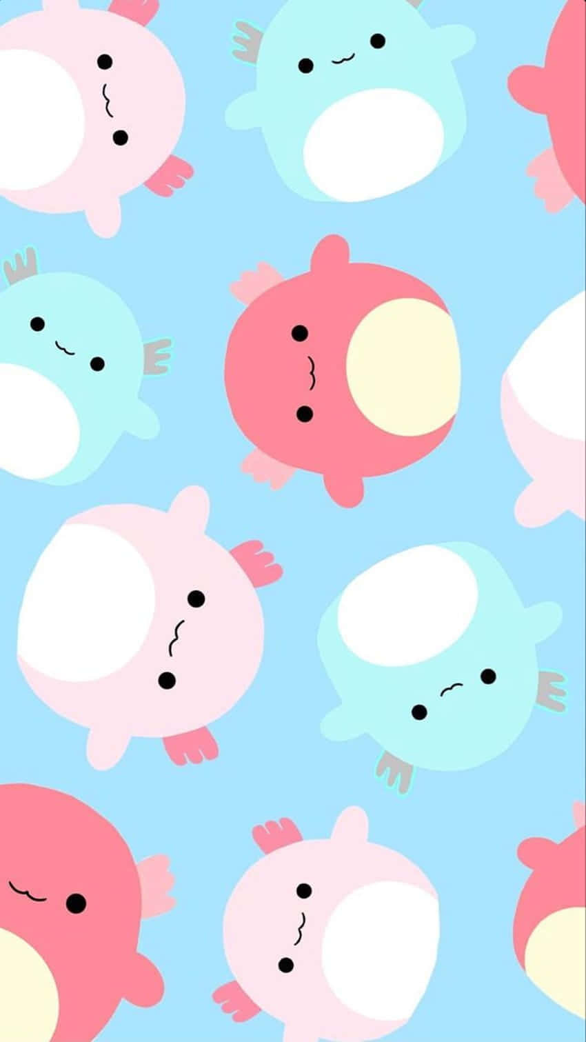 在粉藍色圖案中漂浮的可愛卡通蠑螈。 — Squishmallows 壁紙