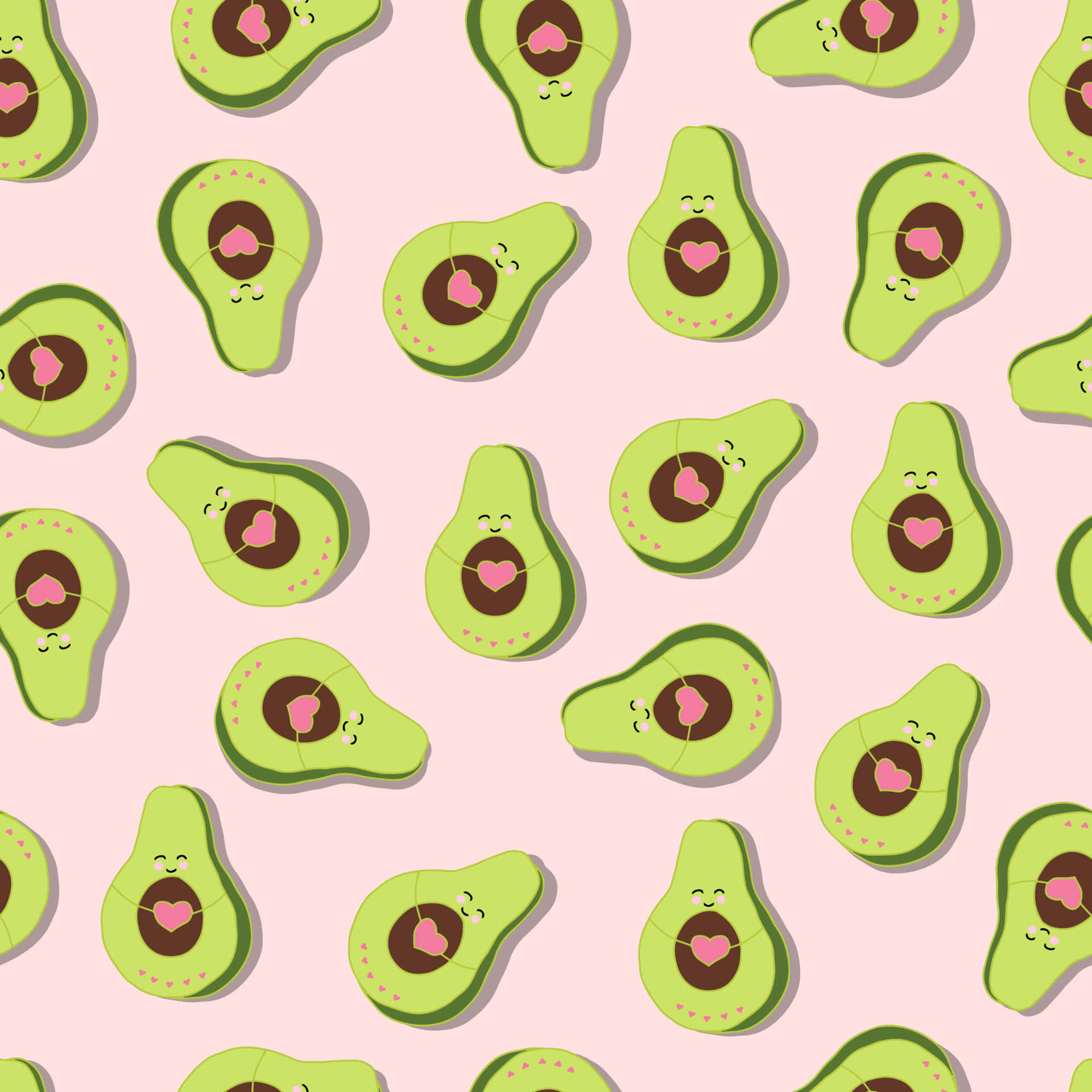 Cute Avocado 桌布 壁紙 — 可愛的酪梨切片，帶有笑臉和粉紅愛心，在柔和的粉紅背景上重複。