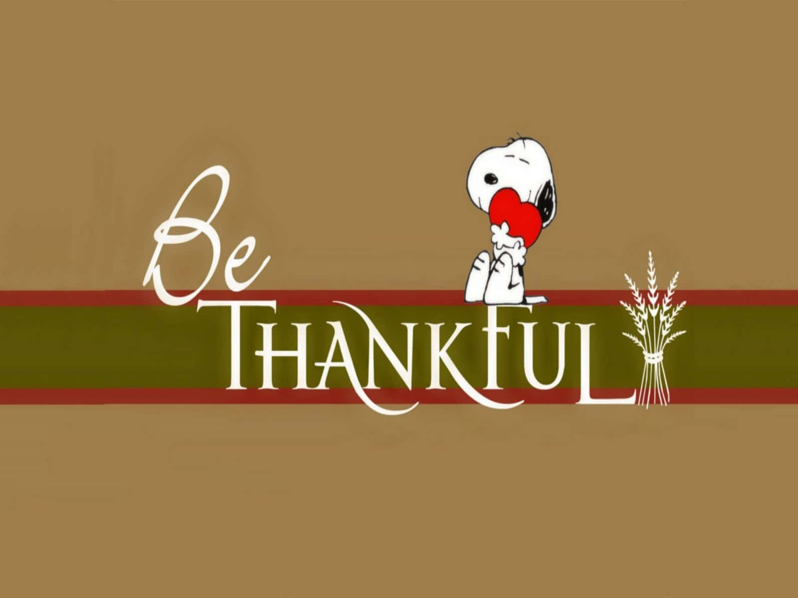史努比拿著一顆紅心，旁邊有「Be THANKFUL」文字和麥穗。 — 史努比 壁紙