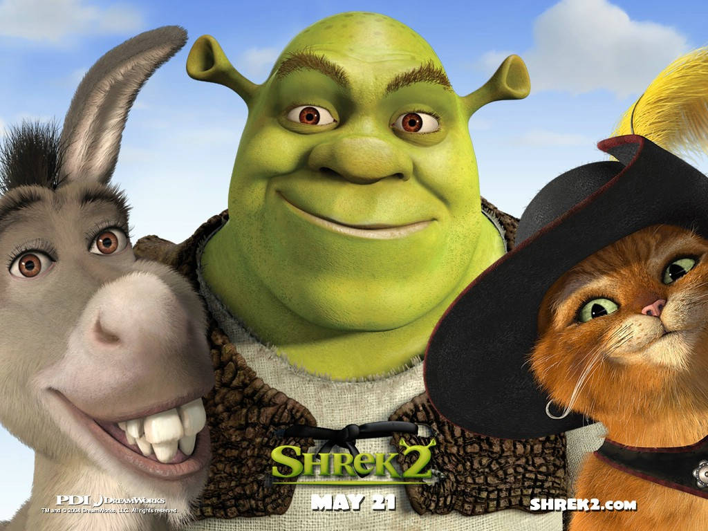 Shrek 2 桌布 壁紙 — 史瑞克、驢子和穿靴子的貓在明亮的藍天下微笑，這是一張宣傳電影海報。