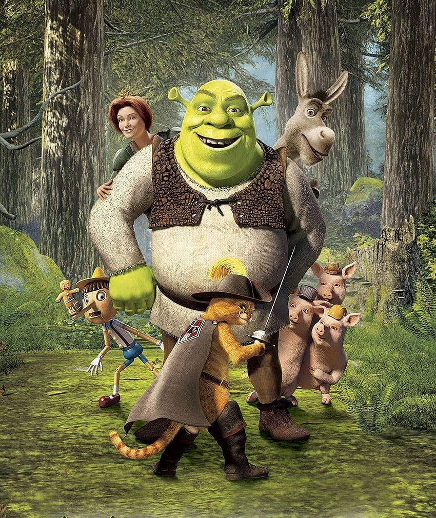 Shrek 2 桌布 壁紙 — 史瑞克和他的朋友們愉快地走過一片茂密的綠色森林，樹木高大，地面長滿苔蘚。