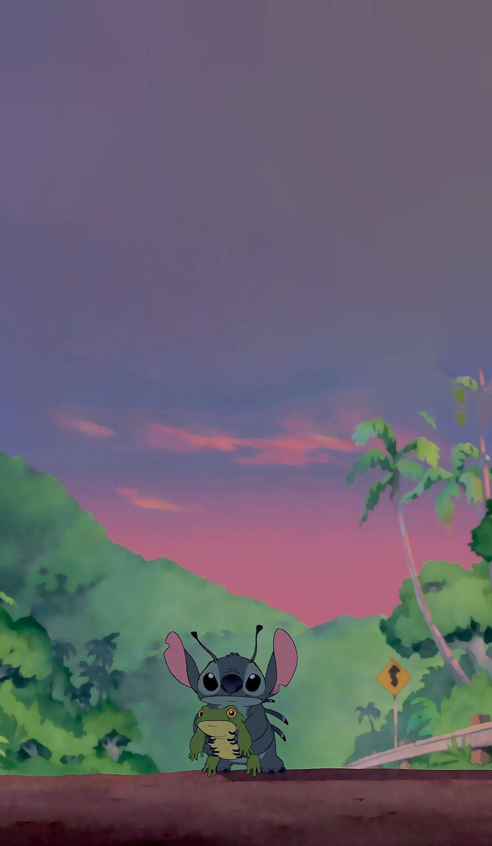 星際寶貝 桌布 壁紙 — 史迪奇在黃昏時在路邊拿著一隻青蛙，背景是紫粉紅色天空和綠色山丘。