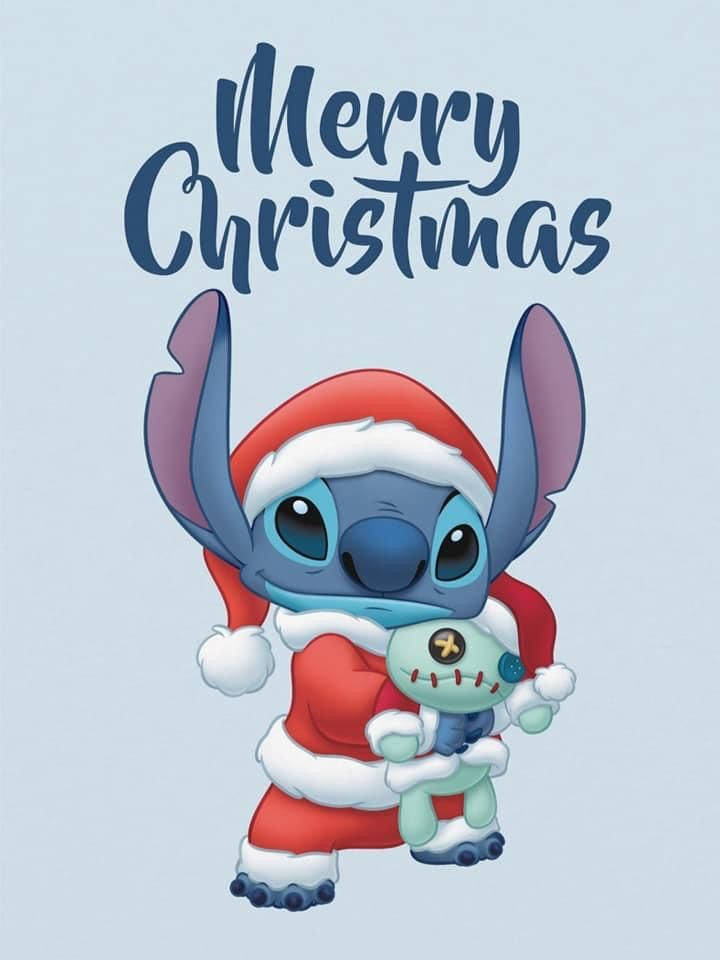 史迪奇打扮成聖誕老人，抱著一個縫製玩具，上方有「聖誕快樂」的文字。