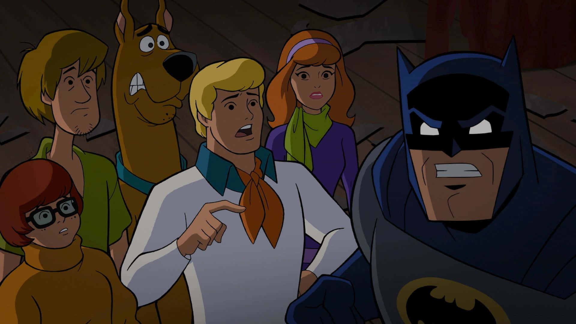 Batman The Brave And The Bold 桌布 壁紙 — 史酷比幫和蝙蝠俠一起站在燈光昏暗的房間裡，表情震驚而嚴肅。