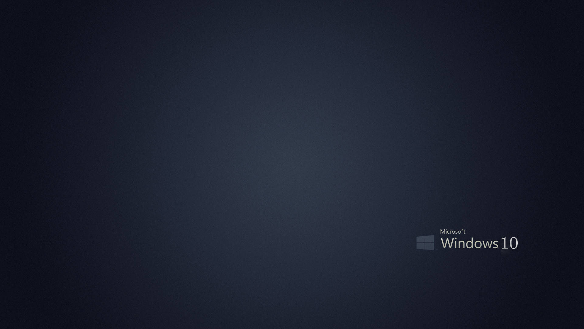 Dark Windows 桌布 壁紙 — 右下角帶有 Microsoft Windows 10 標誌的簡約深藍色漸變桌布。