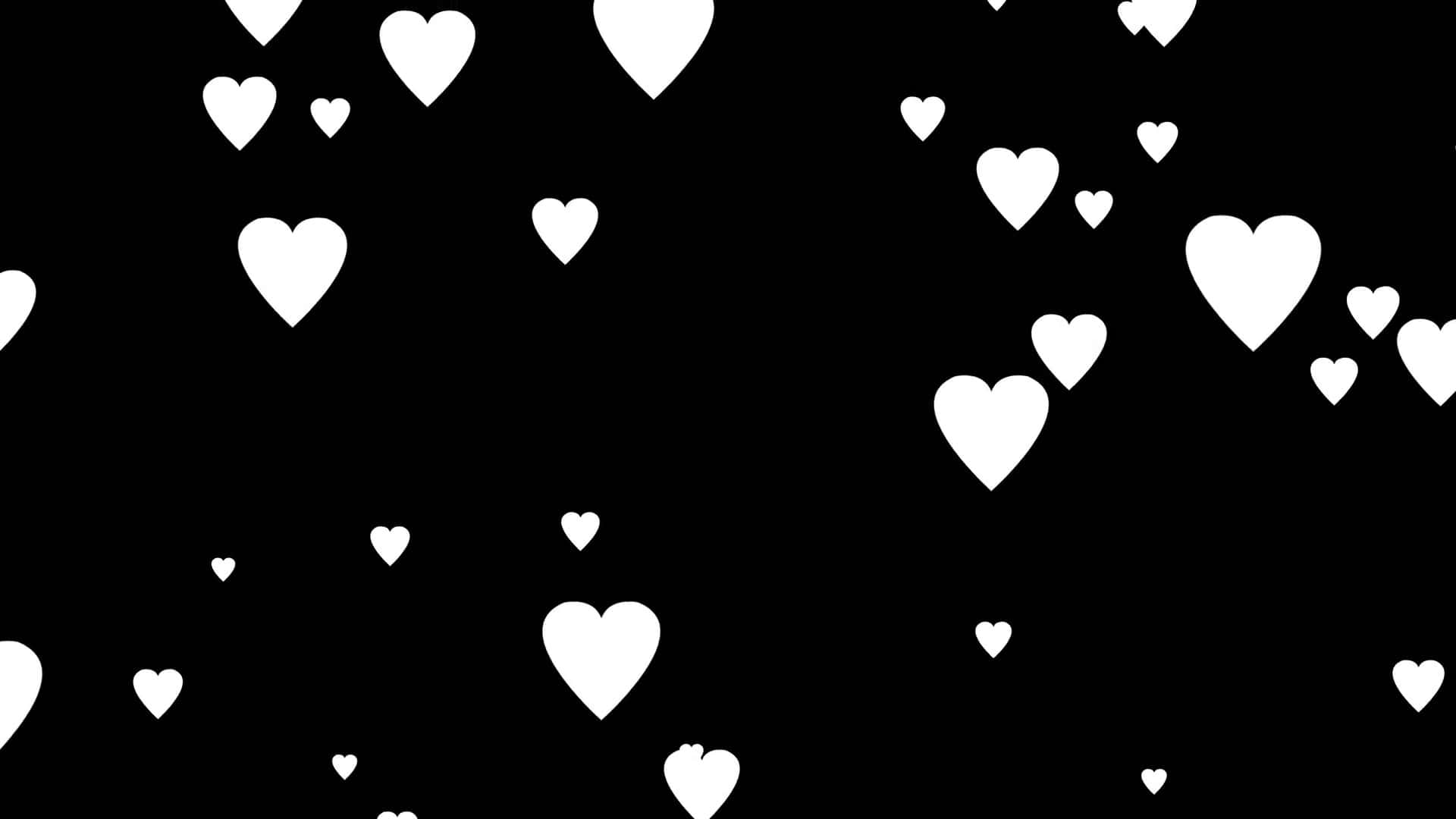 Black And White Heart 桌布 壁紙 — 各種大小的白色心形在純黑色背景上輕輕漂浮，營造出極簡浪漫的圖案。