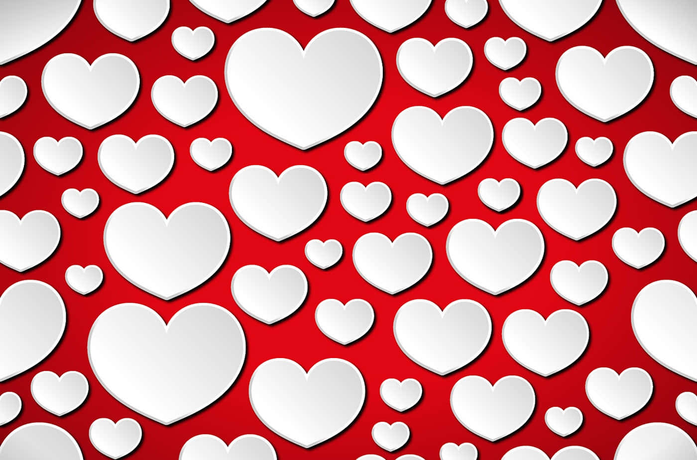 Heart Pattern 桌布 壁紙 — 各種大小的白色心形在鮮豔的紅色背景上漂浮，營造出節日浪漫的圖案。