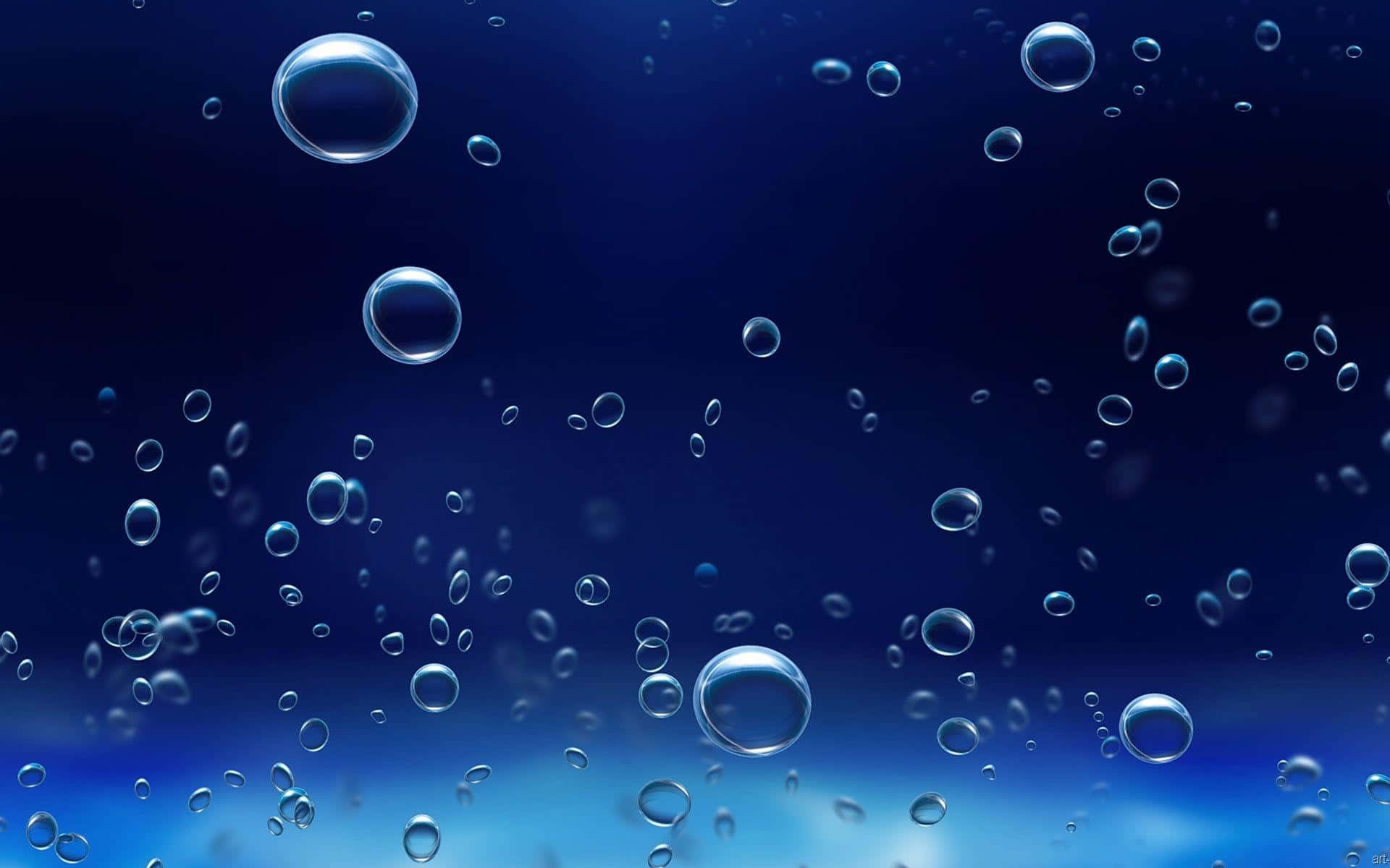 Bubbles 桌布 壁紙 — 各種大小的透明氣泡在漸變藍色背景上優雅地漂浮。