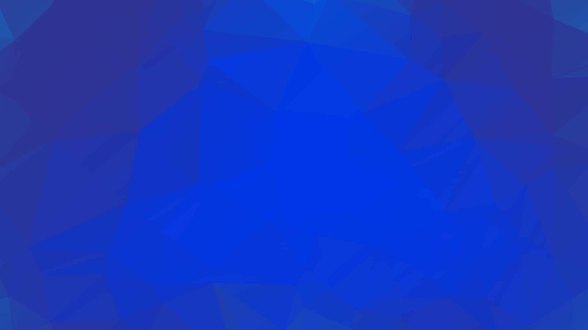 Blue Geometric 桌布 壁紙 — 各種藍色多邊形形狀組成的抽象幾何圖案，營造現代數位背景。