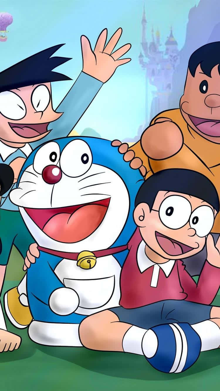 Doraemon 桌布 壁紙 — 哆啦A夢和他的朋友們在明亮的戶外場景中歡笑，背景有一座城堡。