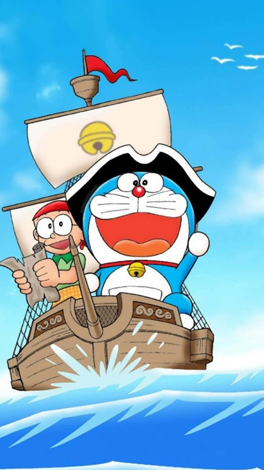 Doraemon 桌布 壁紙 — 哆啦A夢和他的朋友駕駛一艘帶有紅旗的木製海盜船，在晴朗的天空下穿越明亮的藍色海浪。