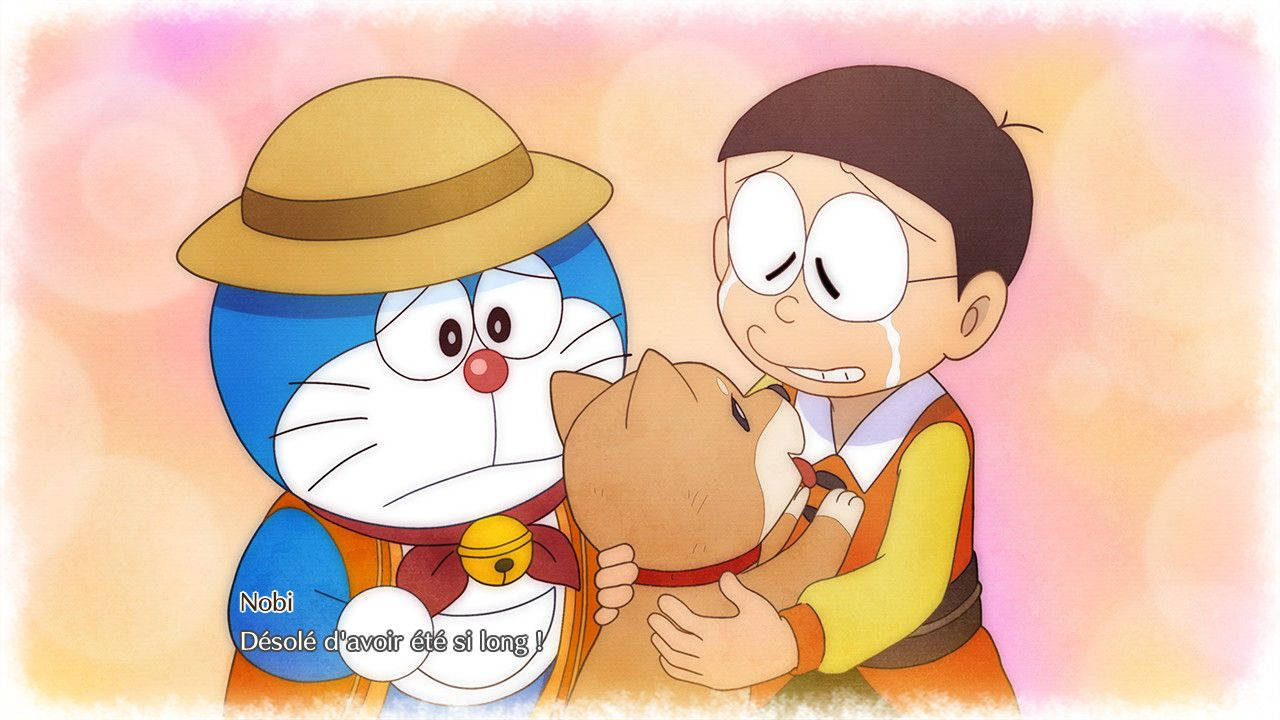 Doraemon 桌布 壁紙 — 哆啦A夢和大雄在柔和的粉彩散景背景下，分享一個溫馨的時刻，擁抱一隻小貓。