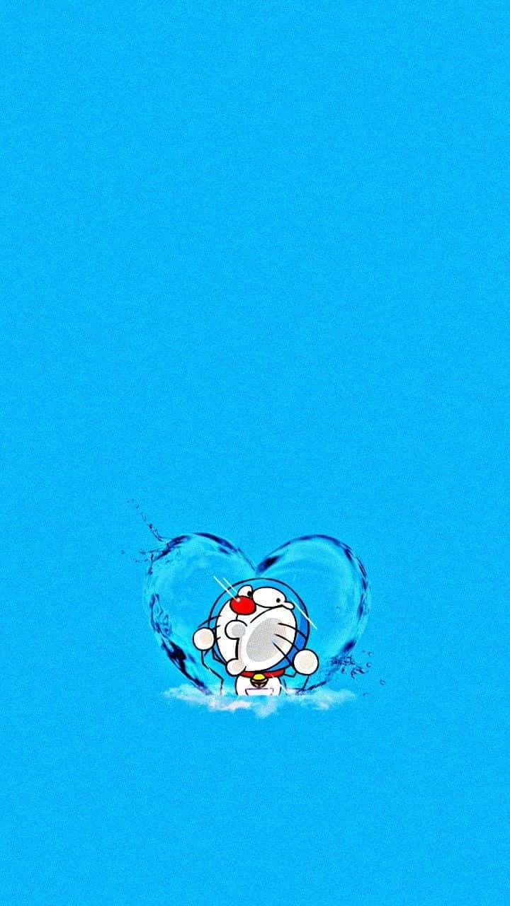 Doraemon 桌布 壁紙 — 哆啦A夢站在心形水花中，背景為純藍色。