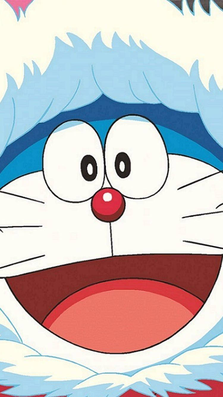 Doraemon 桌布 壁紙 — 哆啦A夢開心的大頭特寫，眼睛睜得大大的，藍色蓬鬆頭髮和紅色鼻子，襯著柔軟的奶油色背景。