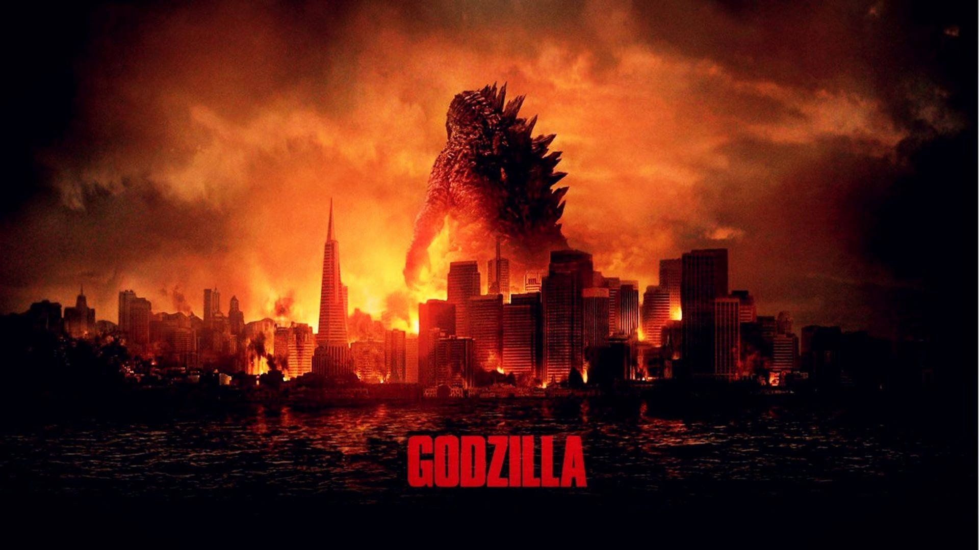 shin godzilla 桌布 壁紙 — 哥吉拉從烈焰毀滅中崛起，在末日般的橙色天空下摧毀燃燒的城市天際線。