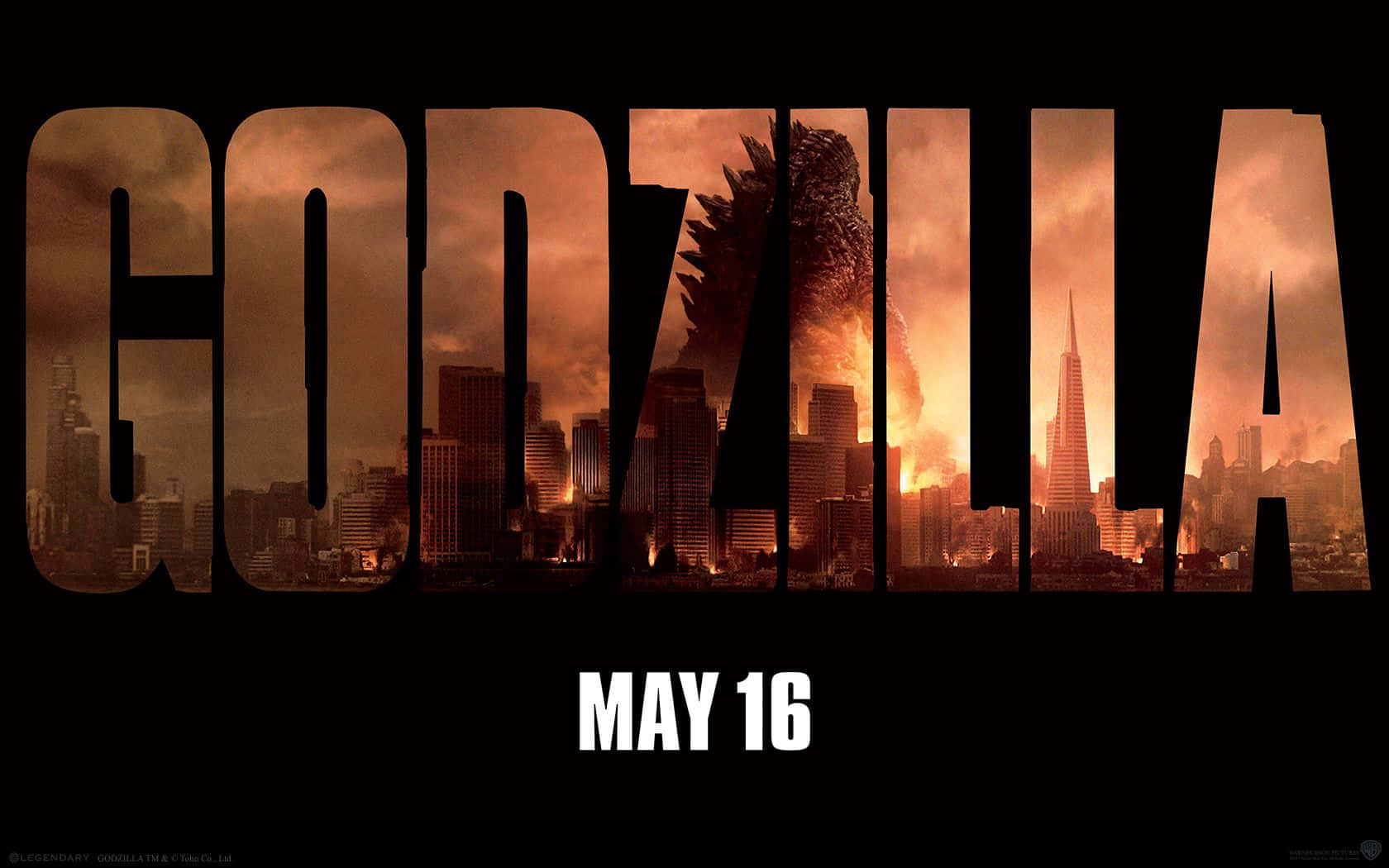Godzilla 2014 桌布 壁紙 — 哥吉拉從烈焰毀滅中現身，其剪影聳立於燃燒城市景觀上方的標題字母之後。