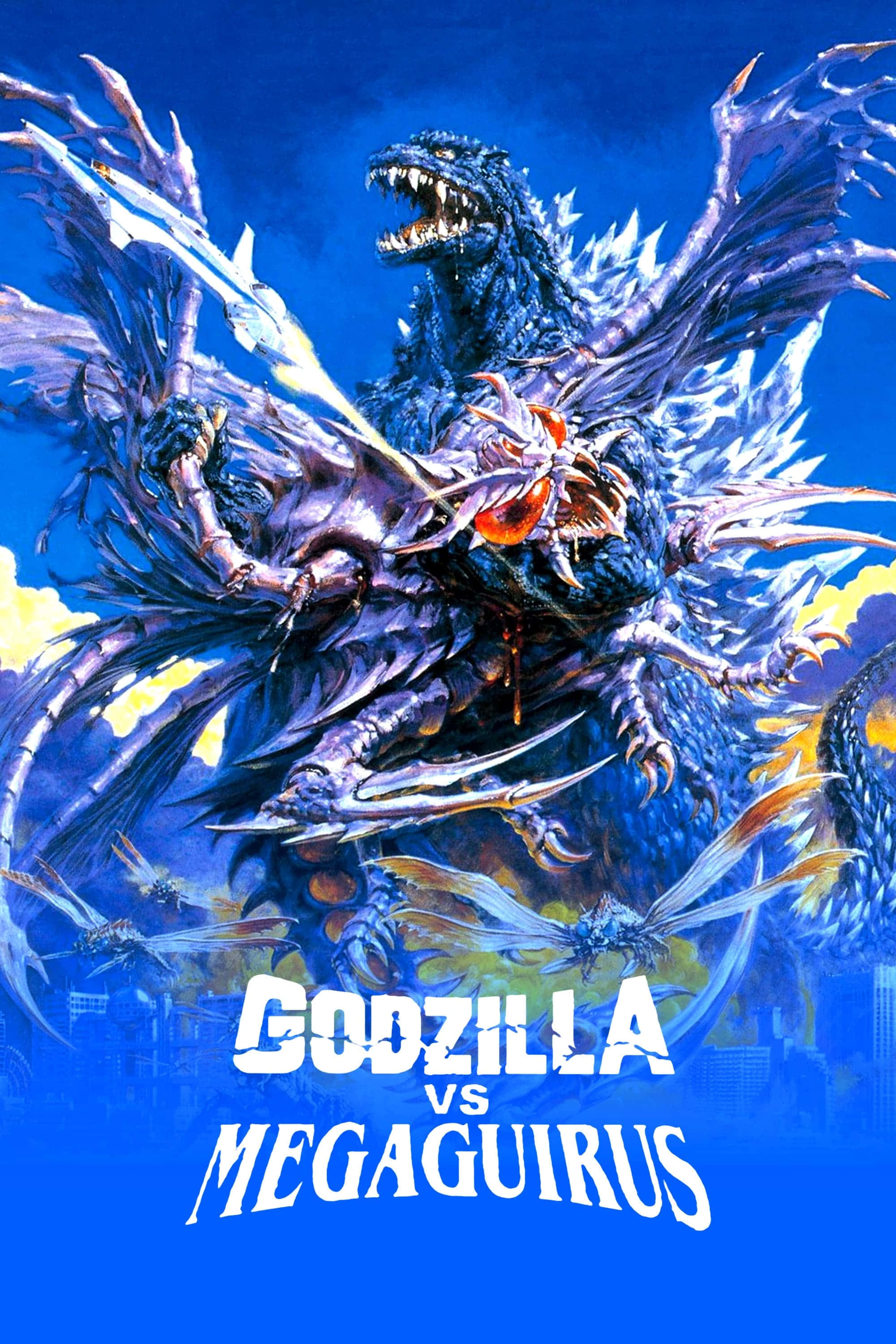 Godzilla Vs Megaguirus 桌布 壁紙 — 哥吉拉與有翼怪獸美加基拉斯戰鬥，背景是鮮豔的藍天，下方是城市廢墟。