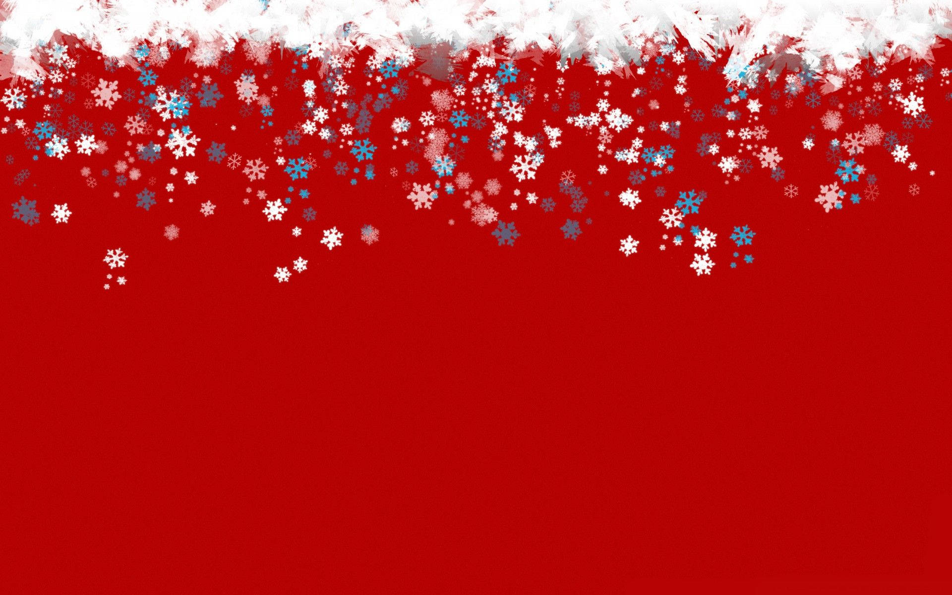 聖誕節 桌布 壁紙 — 喜慶的紅色背景，頂部有雪白邊框和飄落的白色與藍色雪花。