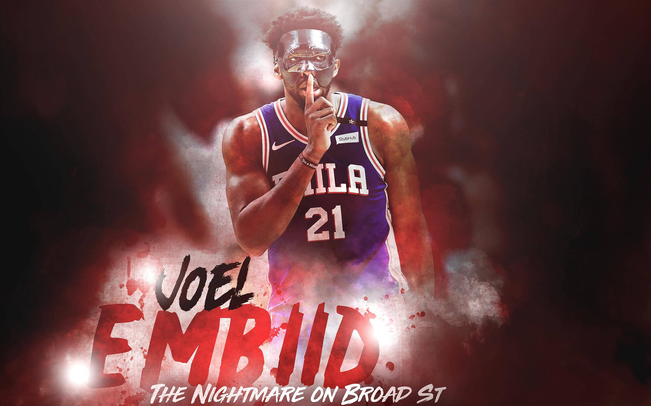 Embiid 桌布 壁紙 — 喬爾·恩比德身穿費城76人球衣，在火紅煙霧中將手指放在嘴唇上，下方有粗體文字。