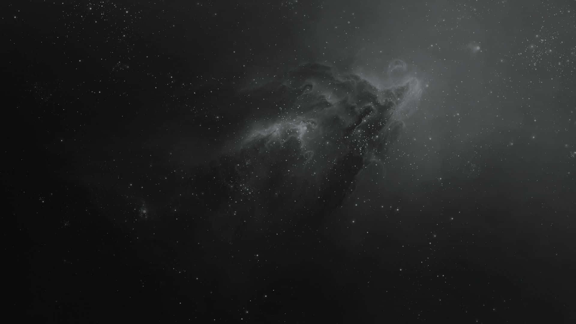 Dark Space 桌布 壁紙 — 單色宇宙星雲在深空星場中旋轉，帶有飄渺的絲縷。