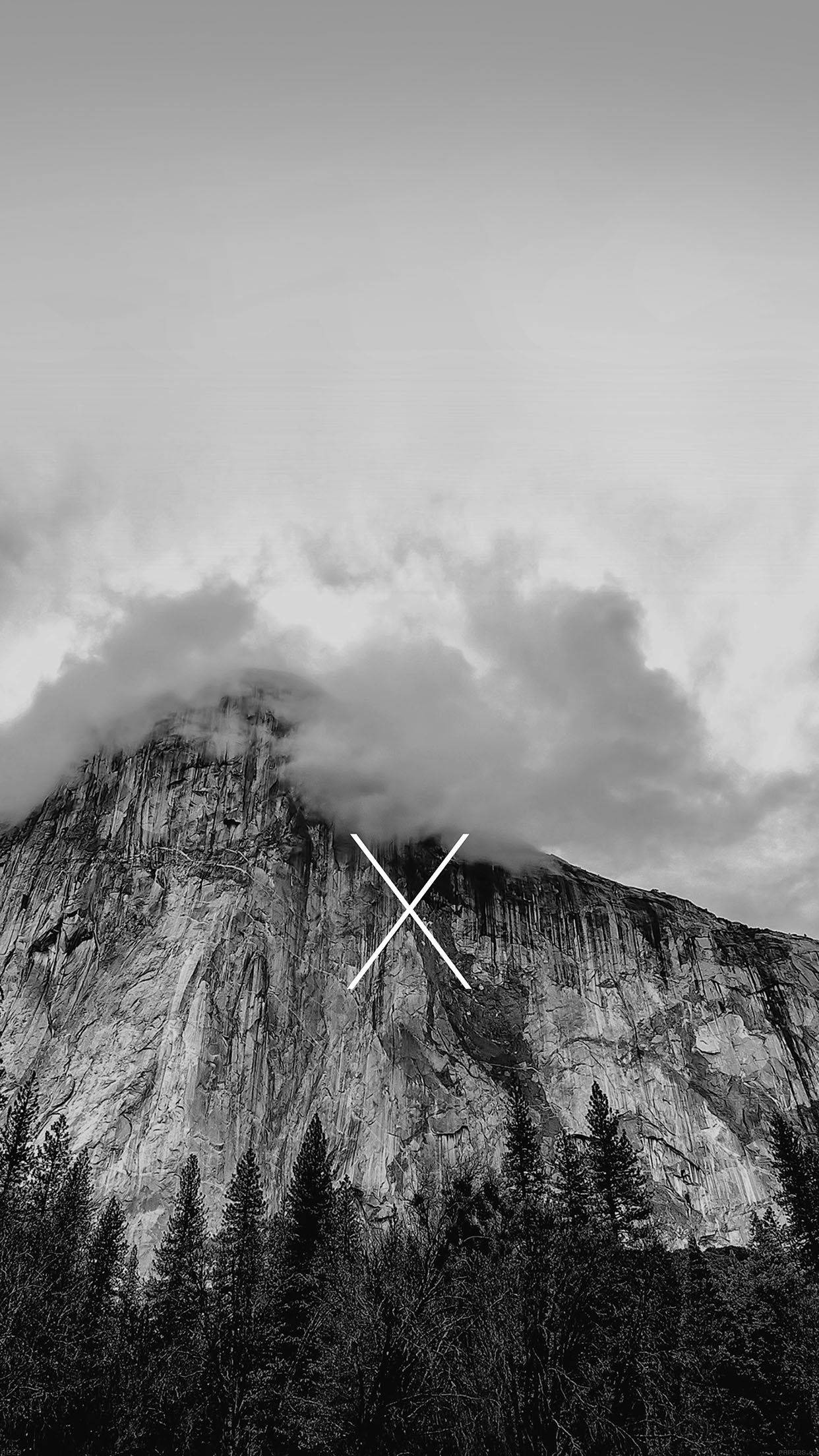 Black And White iPhone 桌布 壁紙 — 單色山峰部分被雲霧籠罩，山頂上疊加了一個醒目的白色X。