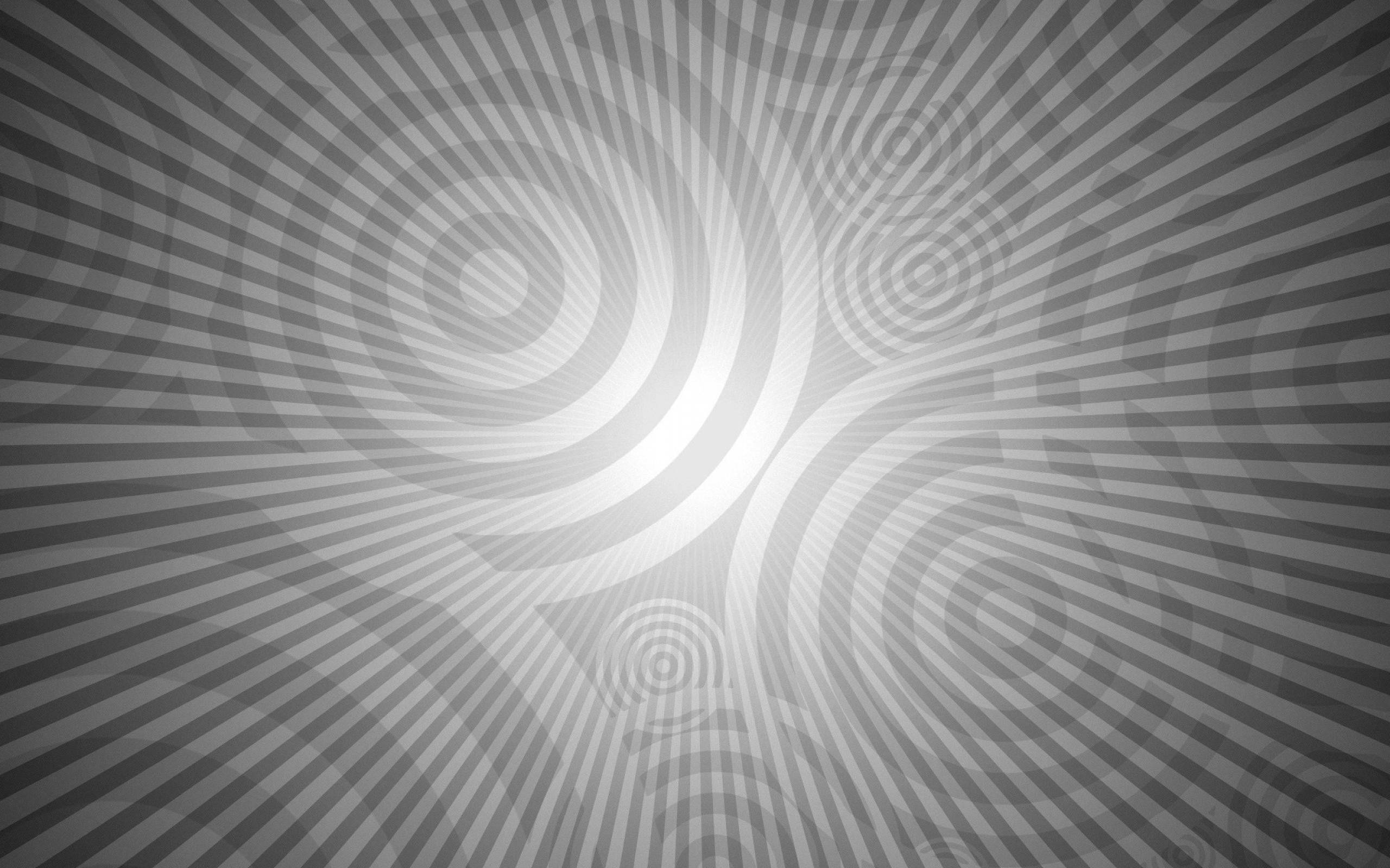 Hypnosis 桌布 壁紙 — 單色抽象圖案，由放射線條和同心螺旋組成，營造出催眠般的錯覺效果。