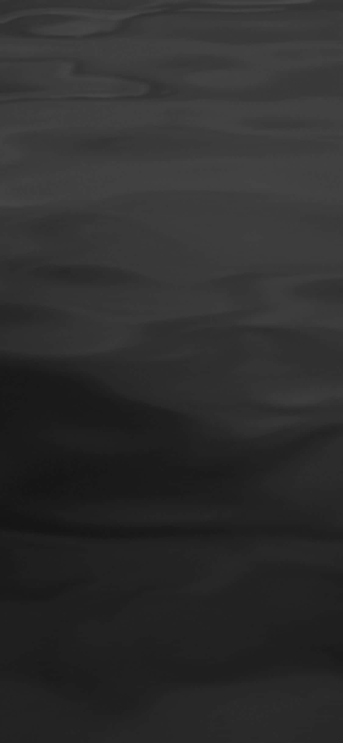 Dark Gray 桌布 壁紙 — 單色抽象紋理，呈現流動的深色水波紋，帶有細微漸變和柔和陰影。