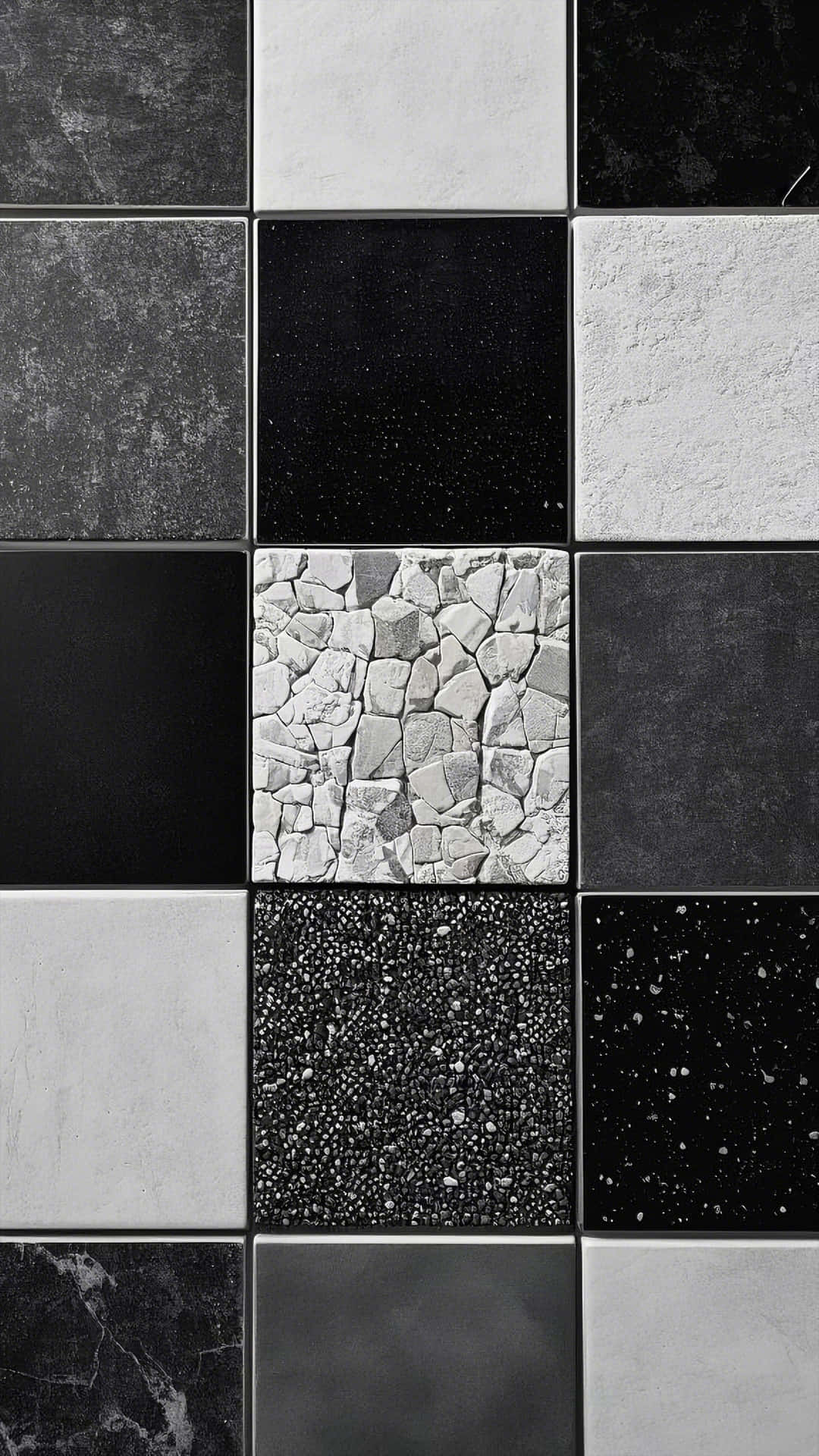 diverse mosaic of textured square tiles in neutral tones 壁紙 — 單色瓷磚網格展示從光滑到粗糙石頭及斑點表面的多種紋理。